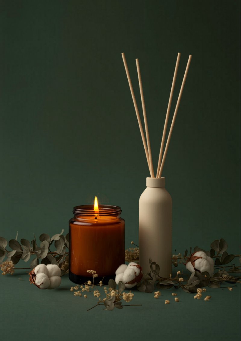 Home fragrance collection — candles and diffusers on a styled shelf